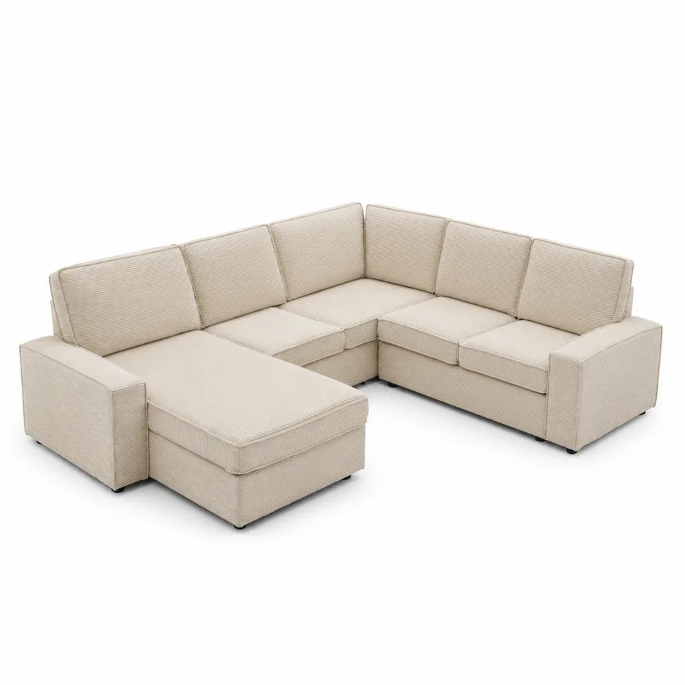 Sof¨¢ modular en L de pana beige con chaise longue y cojines dese